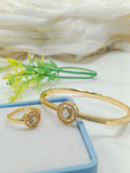 Gold-plated floral rosette bangle and ring set with center stone