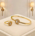 Gold-plated floral rosette bangle and ring set – luxury display