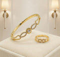 Gold-plated infinity wave bangle and ring set – luxury display